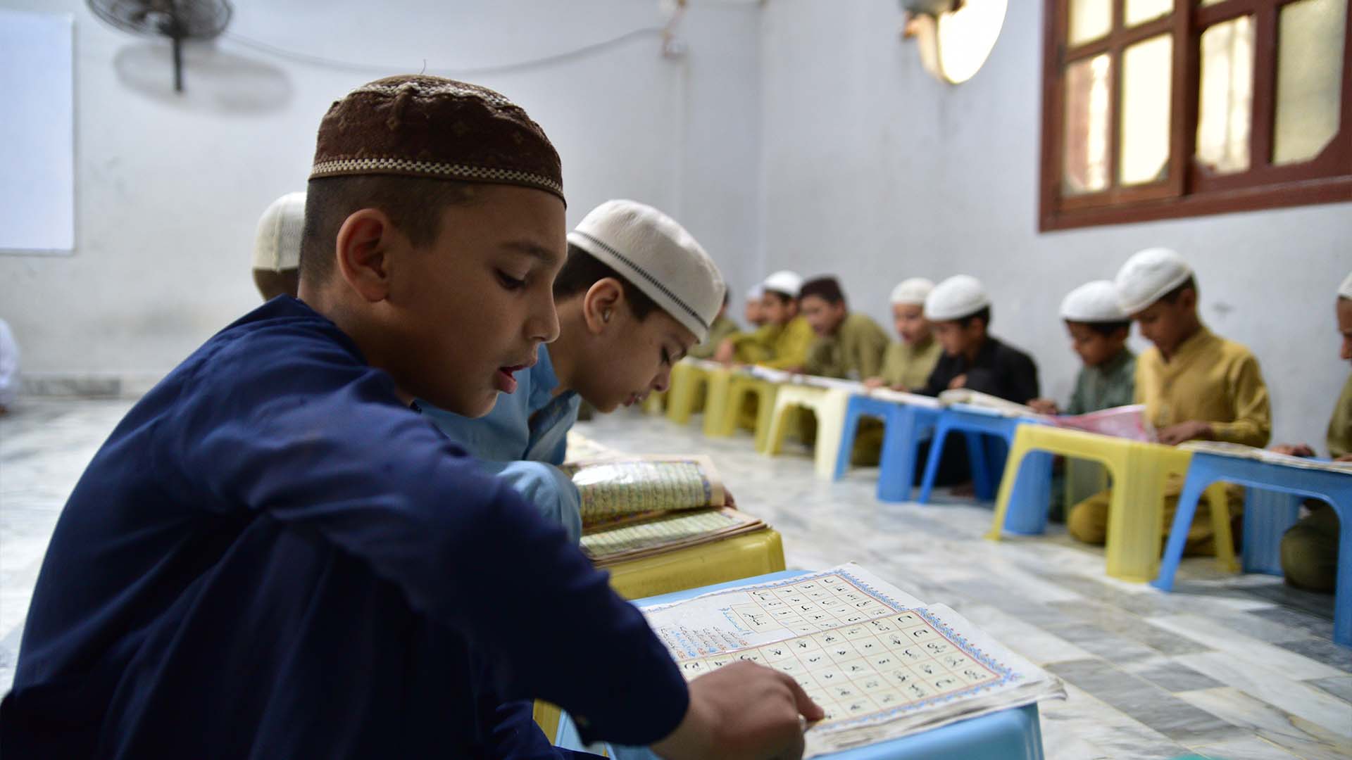 Students learning Tajweed in Binoria