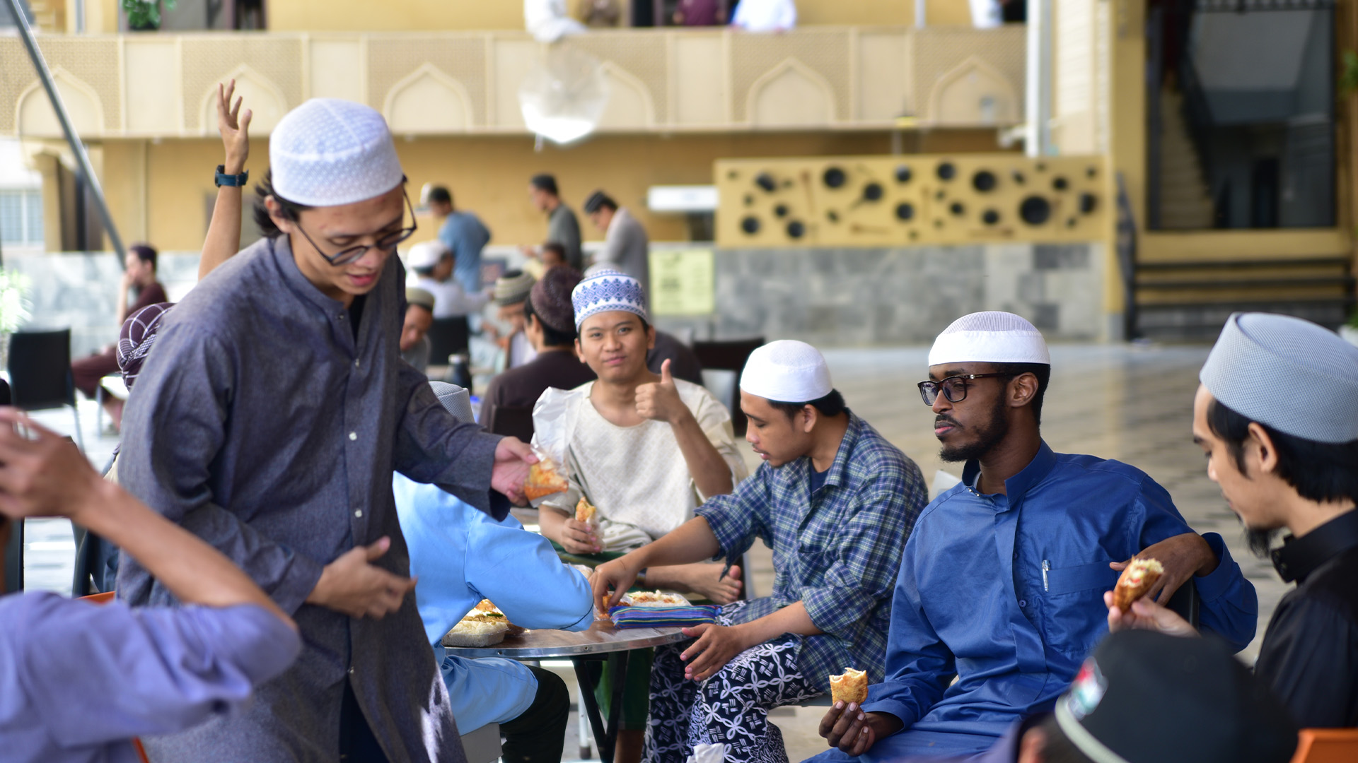 Students eating and chatting in canteen